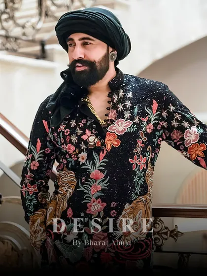 Every detail is a statement. This close-up highlights the fierce tiger and delicate floral embroidery, a combination that defines my brand of bold, artistic menswear.