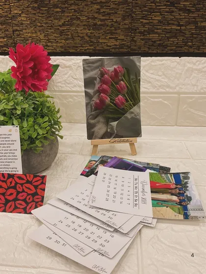The calendar cards are versatile. You can display the current month on the easel and keep the others fanned out as a collection of your favorite moments.