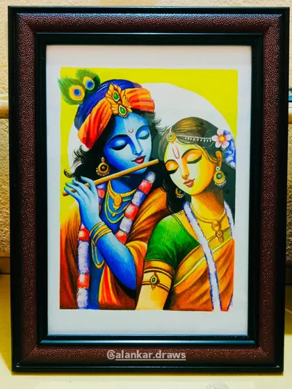 The completed Radha Krishna color sketch, beautifully framed and ready to adorn a wall. A frame adds a classic touch and makes it a perfect piece for home decor or as a gift.