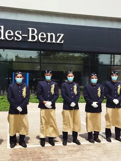 Our professional team ready for service at a bespoke breakfast event for Mercedes-Benz T&T Motors. We specialize in corporate catering that aligns with the prestige of world-class brands, ensuring every detail reflects excellence.