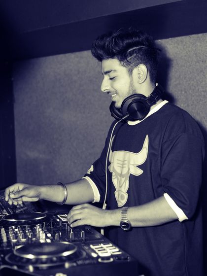 A throwback shot of me mixing at a club. I've been passionate about DJing for years, and that passion drives every performance.