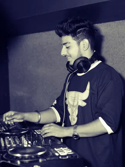 A throwback shot of me mixing at a club. I've been passionate about DJing for years, and that passion drives every performance.