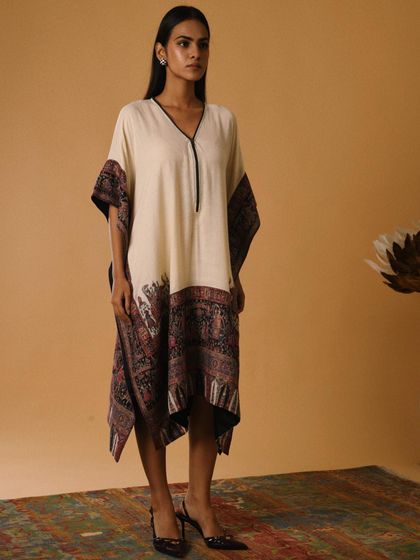 A beautiful printed kaftan styled for a resort wear collection. The easy, flowing silhouette makes it a versatile piece, and my styling aimed to highlight its effortless elegance for a festive holiday look.