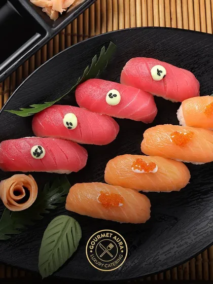 Another angle of our fresh tuna and salmon nigiri, emphasizing the quality of the fish and the precision of the presentation.