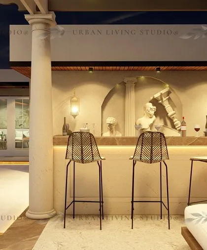 A view of the bar area from the Boho-chic Gurgaon design. The arched niches and classical sculptures behind the bar add a unique, artistic touch.