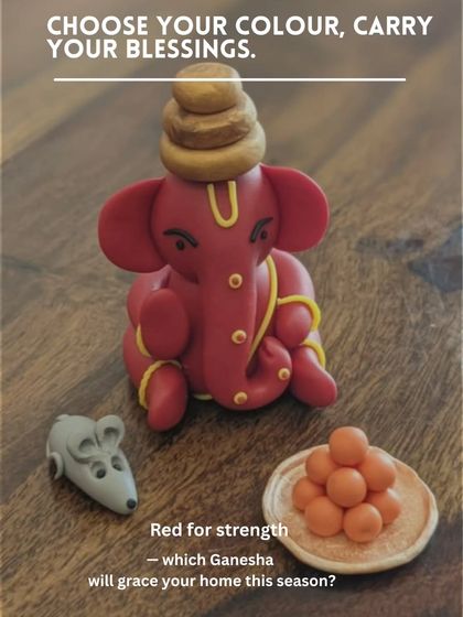 Choose your blessings. This Ganesha in a vibrant red for strength is accompanied by his mouse and a plate of modaks, all sculpted by hand to bring powerful and positive energy into your home.