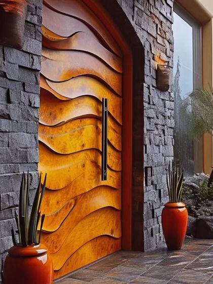 Make a statement with a custom-designed entrance. This wavy, wooden door is complemented by a dark stacked stone wall, showcasing our ability to blend unique artistry with natural materials.