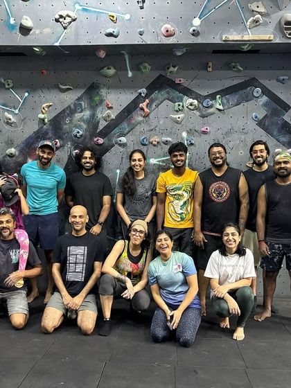 A group photo of our community in front of the climbing wall. Nothing beats the energy of a crew that moves, grows, and levels up together.
