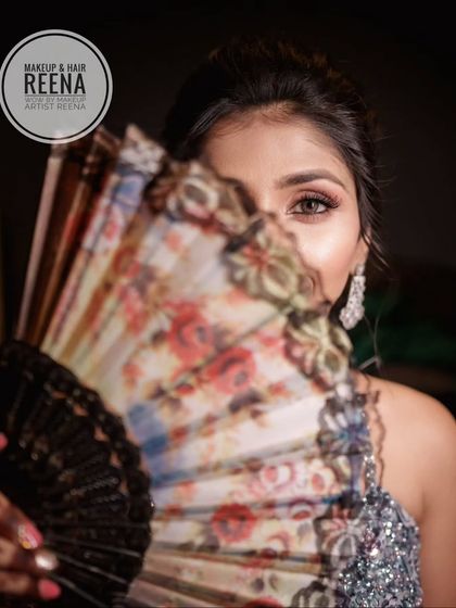 A playful and mysterious shot from Aarjavi's sangeet photoshoot. Her eye makeup looks stunning here.