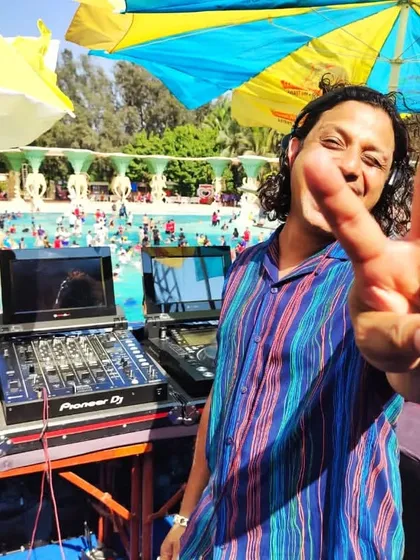 From nightclubs to daytime pool parties, I bring the vibe anywhere. Here I am spinning tracks and soaking up the sun at a massive pool party at The Water Kingdom.