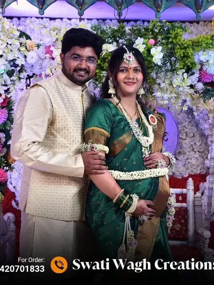 A beautiful couple portrait from a baby shower. The floral decor and her matching jewellery create a picture-perfect scene.
