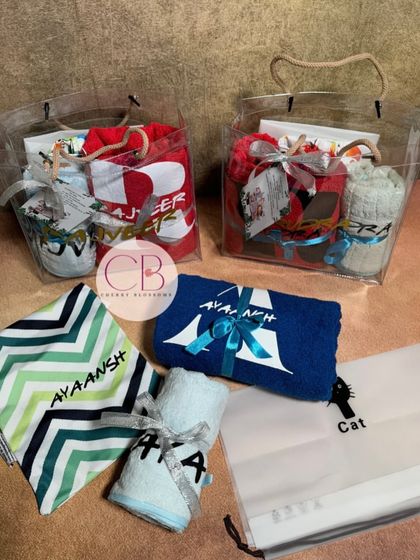 Our customised swimming kits are a great return gift idea. This set includes a personalised bag, towel, hand towel, wet pouch, and shoe bag, all customised with the child's name.