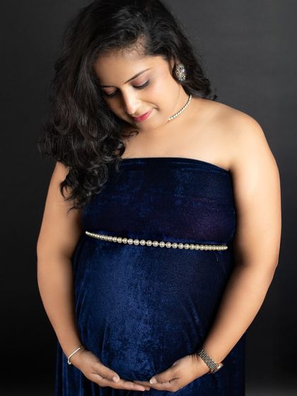 A quiet, contemplative portrait of me during my own maternity shoot. It was a special experience to be on the other side of the camera and feel the magic myself.