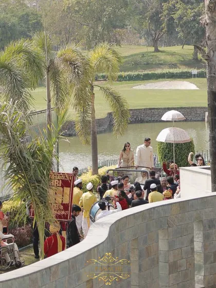 The baraat makes its way along the scenic path of the Jaypee Greens Golf and Spa Resort.