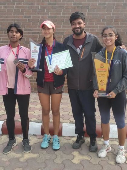 Another shot of our North Zone champions. We foster a competitive yet supportive environment where players push each other to succeed.