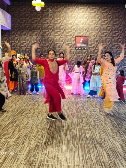 A moment of pure joy and energy from one of our ladies' workshops. This picture captures the fun of learning a new Bollywood routine together in a group setting.