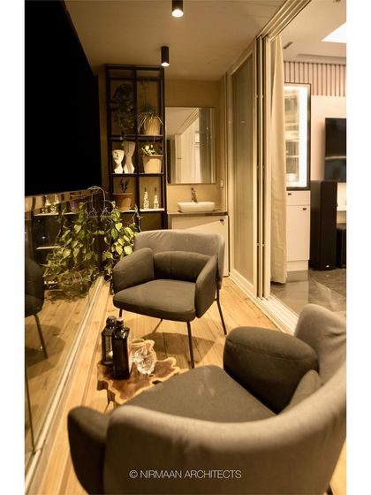 This spacious balcony at Bhagwati Greens is designed as an outdoor lounge. With comfortable seating and ample greenery, it’s the perfect spot to relax and entertain in the evening.