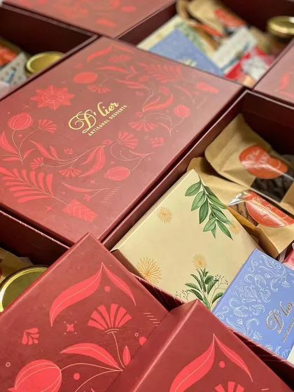 A stunning display of our premium Rakhi hampers, celebrating the special bond between siblings with an abundance of sweet treats.