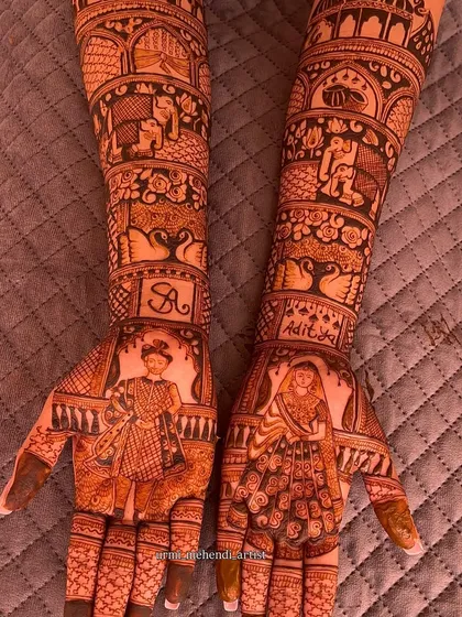 This full bridal mehendi tells a complete story, featuring detailed portraits of the bride and groom. I love working with couples to capture these moments, surrounded by traditional motifs like elephants and swans, making their henna truly one of a kind.