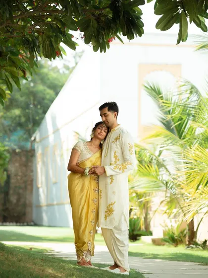 A quiet, romantic moment for the couple amidst the Haldi celebrations. We schedule time for these personal photoshoots within the busy wedding timeline.