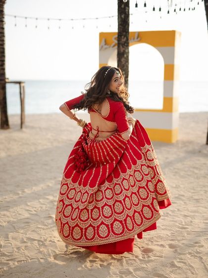 A playful twirl on the beach, showing how these soft waves move and catch the light.