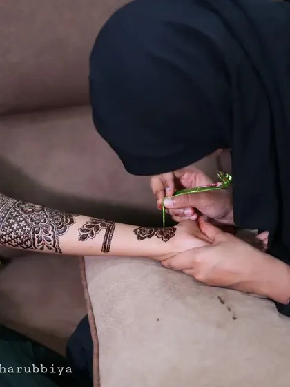 A shot of me working on the upper arm portion of the bridal design.