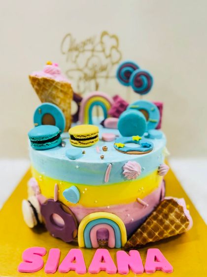 Another shot of the vibrant candyland cake, full of fun textures and colors.
