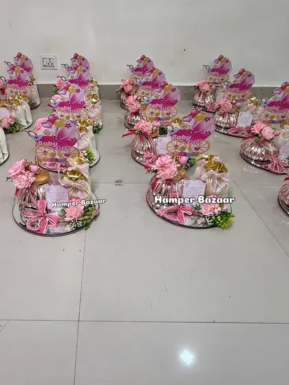 We prepared a large order of these elegant 'Baby Girl' hampers for a client's celebration.
