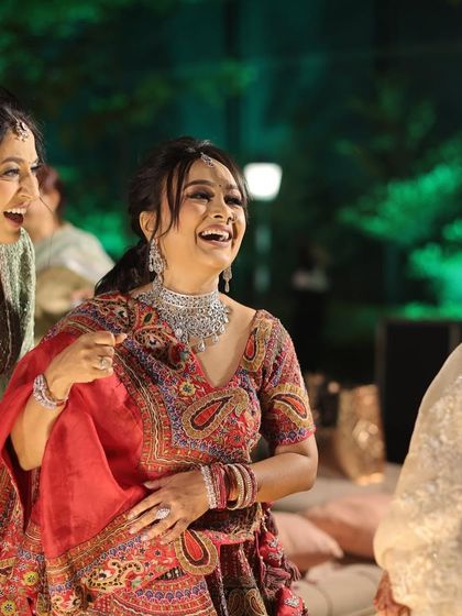 Laughter and joy at a wedding. It's moments like these that I love to see, with my clients feeling happy and confident.