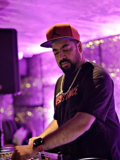 Me in my element, mixing tracks under the purple lights of Kaze.