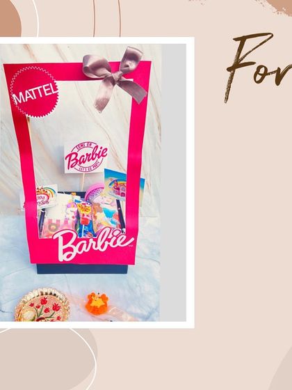 For the sister who loves pink, our Barbie-themed Rakhi hamper is a dream come true. It's a fun, playful, and stylish gift that celebrates her personality.