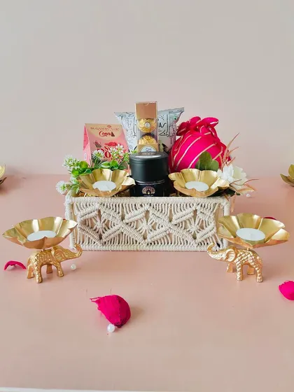 A full view of the macrame tray hamper with the elephant T-light holders. It's a complete decorative set for Diwali.