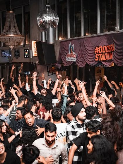 The view from Sarjapur Social, where the dancefloor becomes a stadium of energy. It's an incredible feeling to see so many people united by the music.