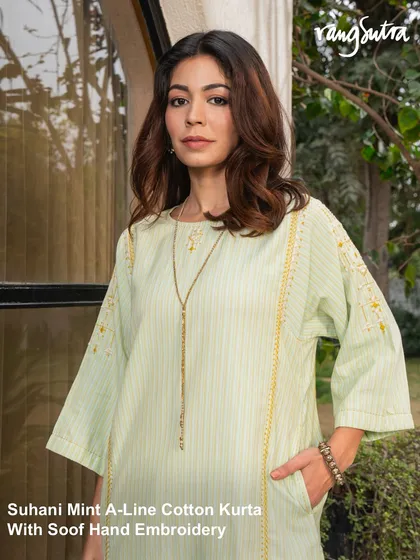 The Suhani Mint A-Line Cotton Kurta features delicate Soof hand embroidery. Made from 100% cotton with woven stripes, it's a breathable silhouette designed for days that ask for both comfort and craft.