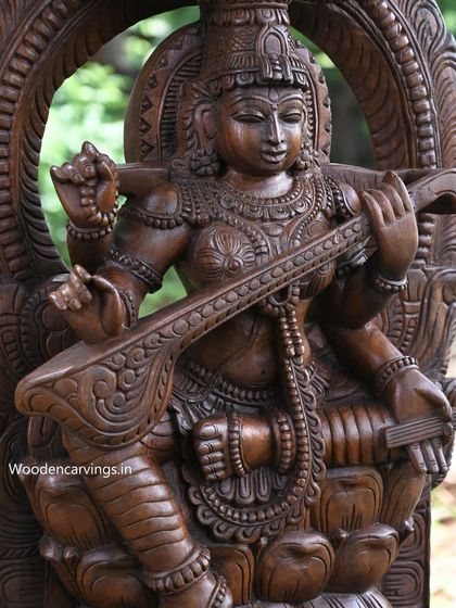 A close-up of the 35.5-inch Shree Maha Saraswathi, focusing on her face and the veena.