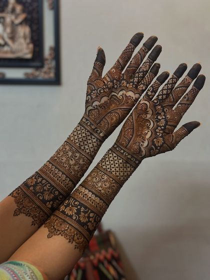 A full-sleeve design with a beautiful mix of geometric and floral patterns, showing great attention to detail.