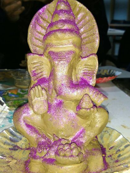 A glittery and joyful clay Ganesha made during one of our festive workshops. These sessions are a popular way to celebrate and create something meaningful.
