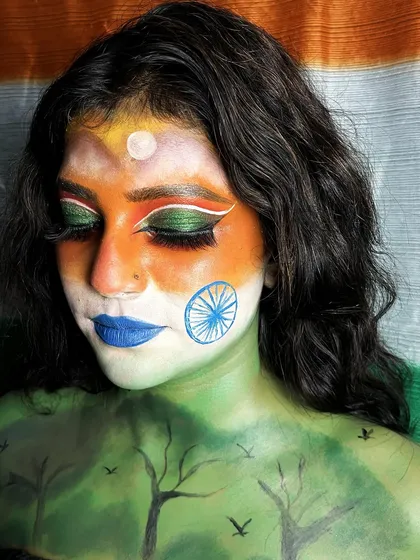 A close-up of the Independence Day body paint, showing the blended eyeshadow and the detailed Ashoka Chakra.
