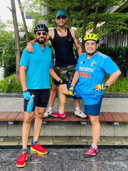 Three of our cyclists posing on a bench. The friendships formed during our rides extend far beyond the bike.