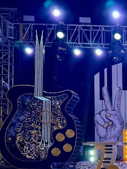 A close-up of the giant, glittering guitar prop that was a centerpiece of the Rockstar stage.