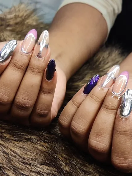 A bold and artistic set combining 3D silver chrome, solid purple, and abstract designs.