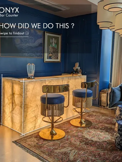 We love a design challenge. For this sophisticated cigar lounge, we engineered an illuminated bar from a colossal block of onyx, creating a glowing centerpiece that is both a functional bar and a work of art.