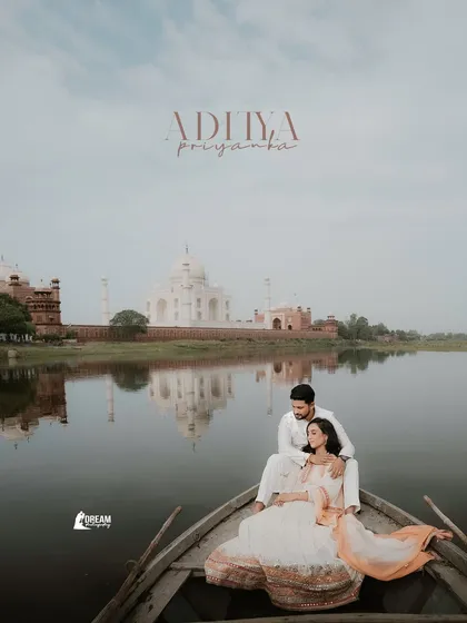 A serene portrait of the couple on a boat, with their names elegantly written above. This is a perfect shot for a personalized wedding invitation or save-the-date.