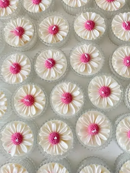 These beautiful daisy candles were customized with a pink center. They are very trendy and perfect for adding a Pinterest-worthy touch to any event.