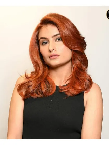 The final result of the copper red transformation. The color is even, glossy, and makes a powerful style statement.