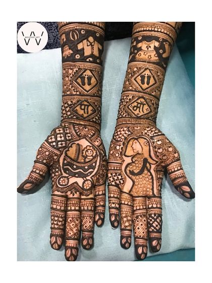 Another look at the story-telling baby shower henna, showcasing the detailed figures and personalized elements.