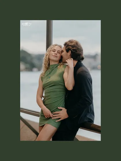 An intimate portrait of Chris and Fifi. By using a tighter frame, the focus shifts entirely to their tender connection, with the beautiful Sydney waterfront providing a soft, atmospheric background.