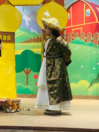 Princess Jasmine and the Sultan in a scene from our kids' theatre production.