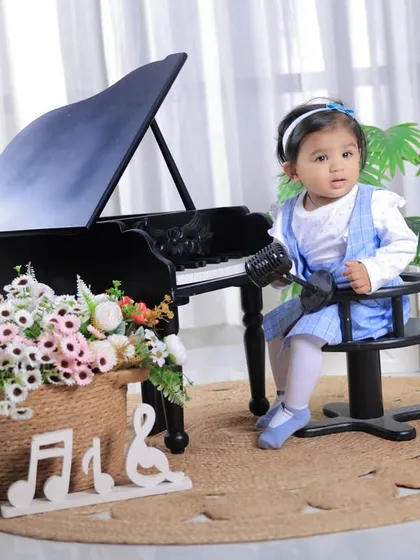An interactive and candid shot from the piano-themed birthday session. We encourage children to play and be themselves, which results in the most natural photos.