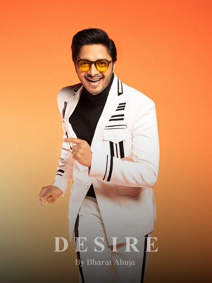 Confidence stitched in every seam. This portrait highlights the unique striped detailing on the jacket's shoulders and pockets.